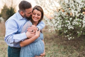 Maternity session in field with white flowers northwest arkansas pregnancy photographer Bentonville Rogers Fayetteville AR - Erica Kirby Photography