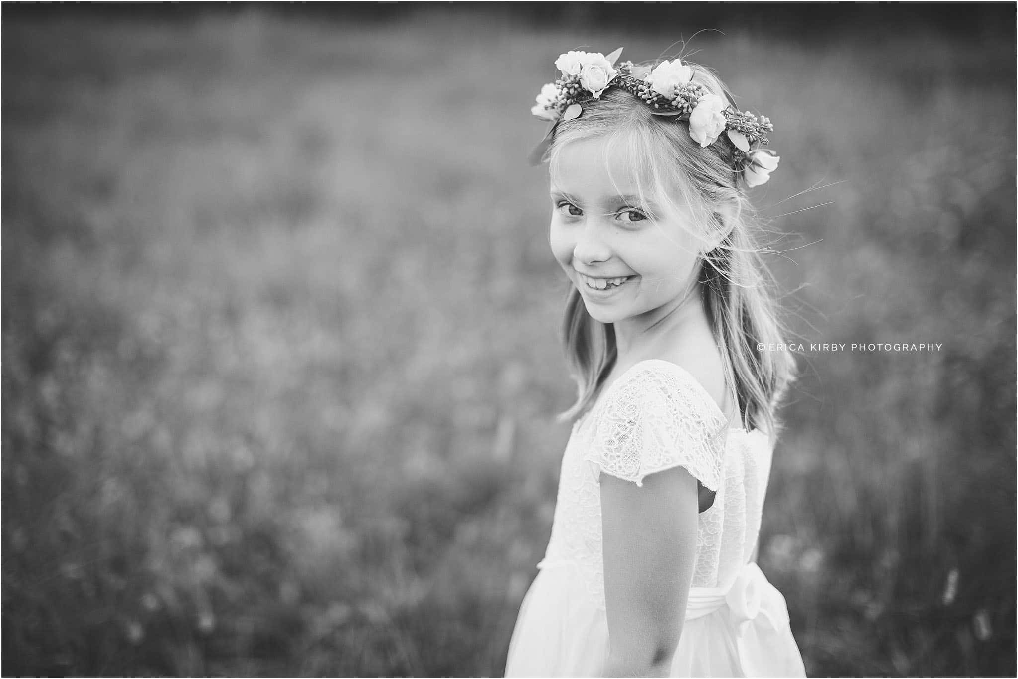 NW Arkansas Children & Family Photographer | 8 year old girl in grassy field in Bentonville AR baptism photo session | Erica Kirby Photography