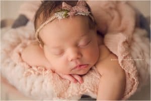 Baby girl newborn session with blush peach and pink styling in Bentonville Arkansas | NWA Newborn Photographer