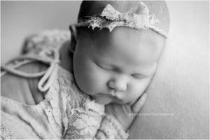 Newborn Photography Bentonville AR | Baby girl newborn session with lots of color, sleeping baby in adorable poses | Erica Kirby Photography