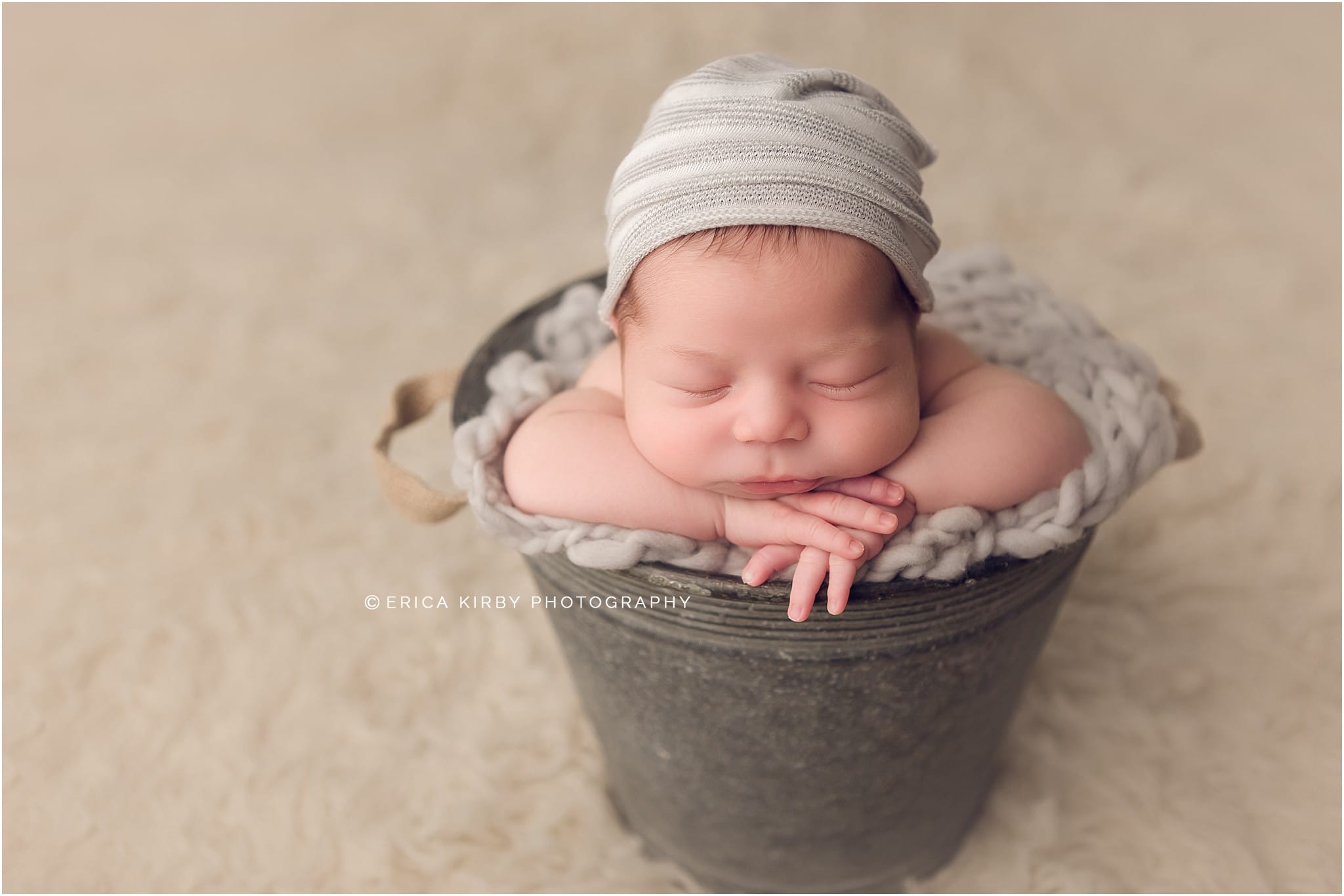 Newborn Photography NWA | Baby boy newborn photography session in Bentonville Arkansas | newborn baby boy posed in metal bucket with slouch hat