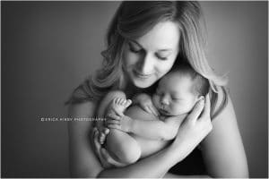 Baby boy newborn photography session in Bentonville Arkansas | newborn baby posing with mom and dad