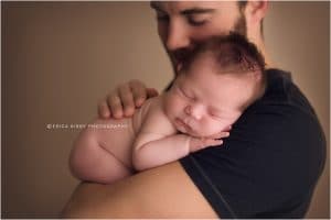 Baby boy newborn photography session in Bentonville Arkansas | newborn baby posing with mom and dad