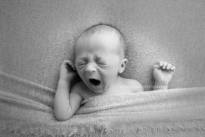Newborn Photographers NWA | Newborn baby boy photo session in Rogers AR baby yawning | Erica Kirby Photography