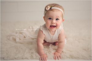 Northwest AR Baby Milestone Session baby girl 9 months old wearing white Tocoto Vintage baby clothing | Erica Kirby Photography