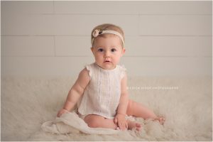 Northwest AR Baby Milestone Session baby girl 9 months old wearing white Tocoto Vintage baby clothing | Erica Kirby Photography