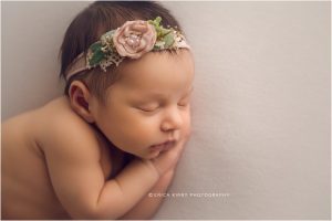 Newborn Photography in Bentonville AR - baby girl newborn session with soft colors classic posing in studio - erica kirby photography