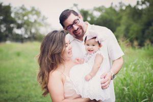 One Year Baby Milestone session - rogers arkansas newborn baby photographer - family photo session in grassy field in northwest AR - erica kirby photography